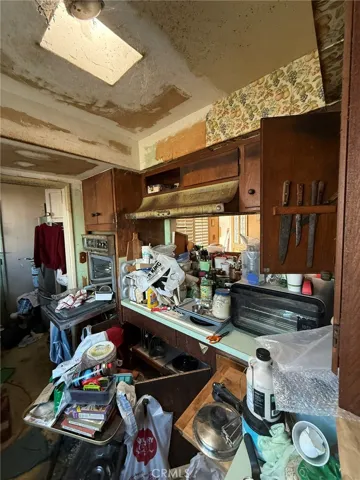This Kitchen is begging for a thoughtful reconfiguration