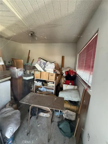View of bedroom with sliding glass door