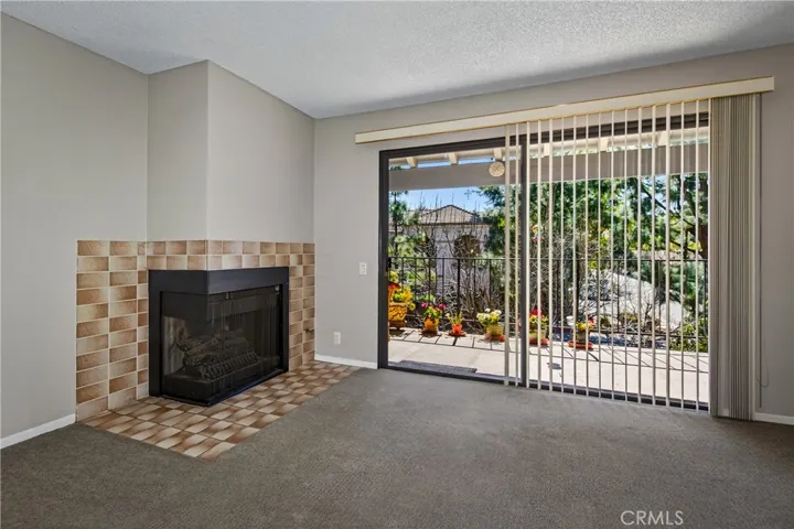 Living room with corner fireplace
