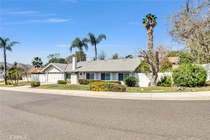 Left of garage is RV Parking behind new vinyl fencing