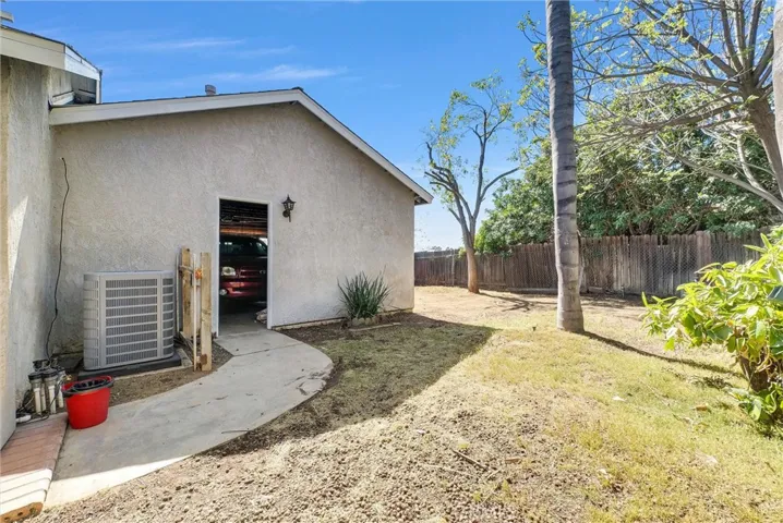 Behind garage