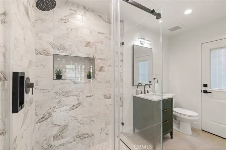 Full downstairs bath with access to the yard. No wet feet in the house!