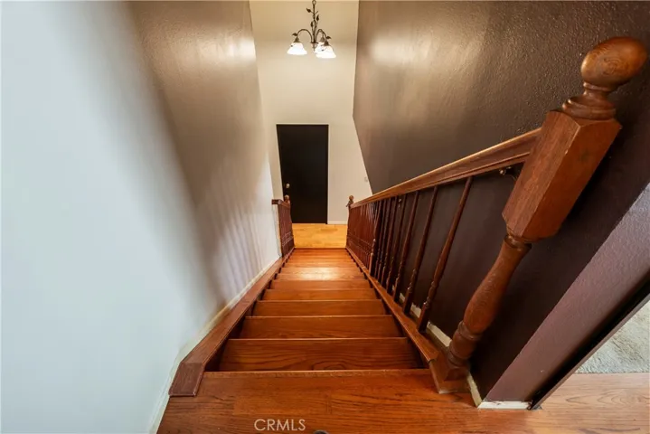 Custom, solid wood hand crafted staircase - looking down from upstairs