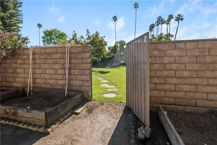 Backyard gate to greenbelt