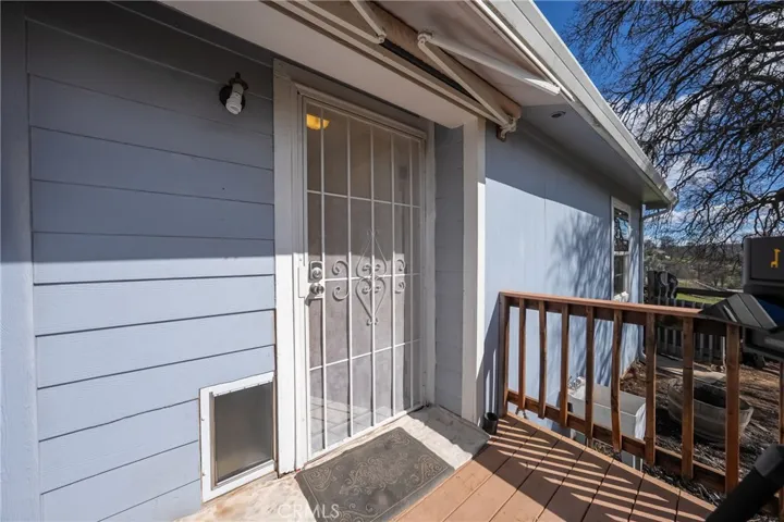 Entry with deck and retractable awning