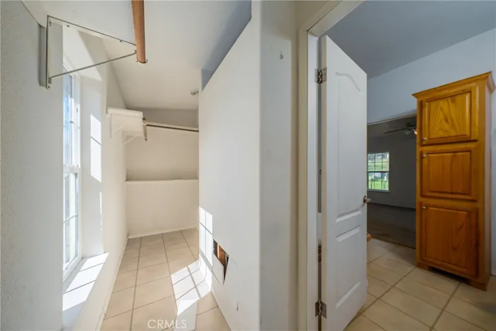 primary bedroom walk-in closet