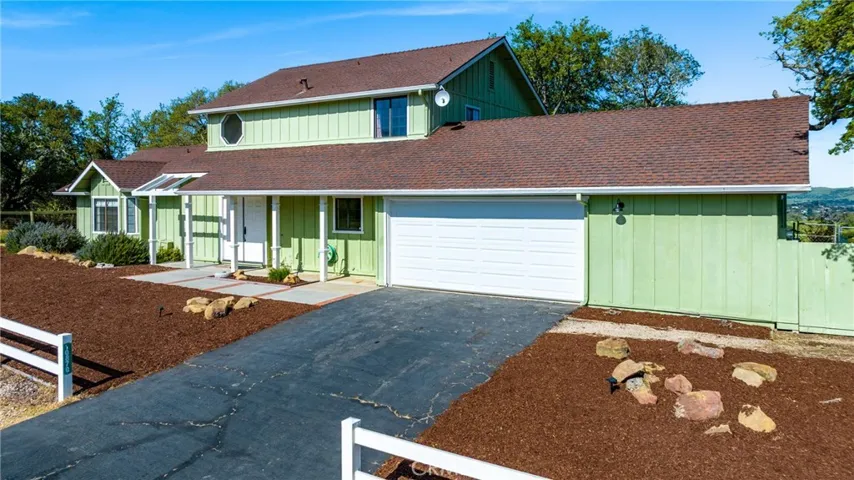 The driveway can easily accommodate multiple vehicles.