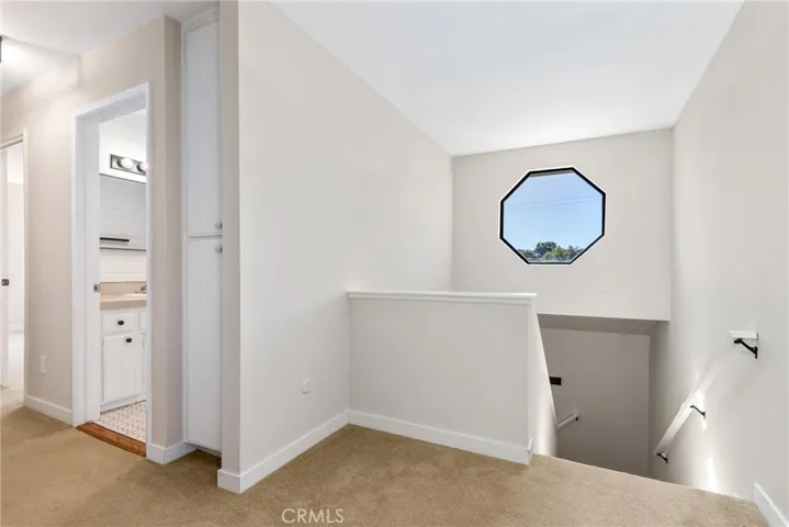 Heading upstairs to see the 3 guest bedrooms and full bathroom.