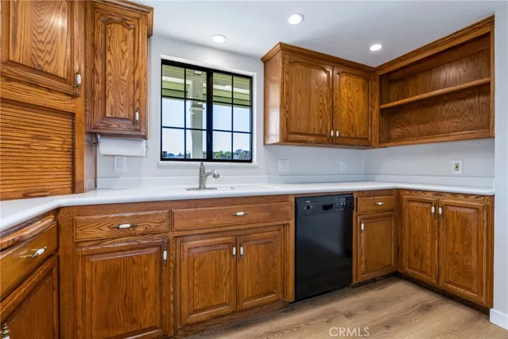 Perfectly positioned window above the sink gives you a lovely view while washing dishes.