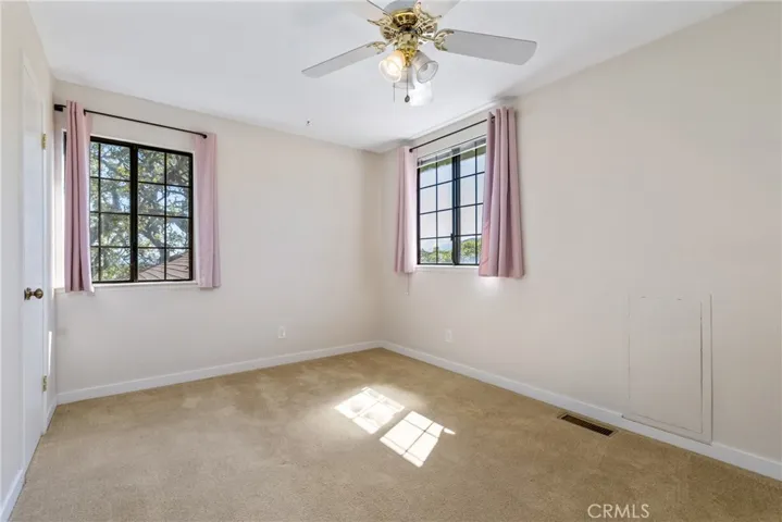 Bedroom 3 has windows that offer great views and a walk-in closet!