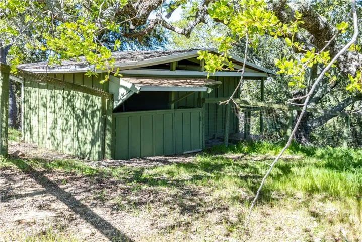 Connected to the pasture is a nice sized barn. On the left is an open-air room and on the right is a closed room.