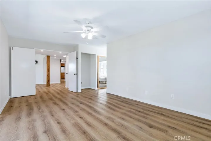 Original photo of primary bedroom.