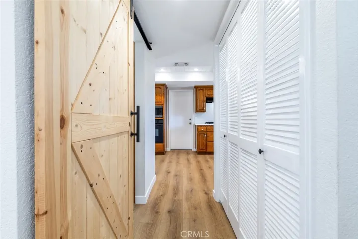 Walking past the kitchen we find a half bath and laundry area.