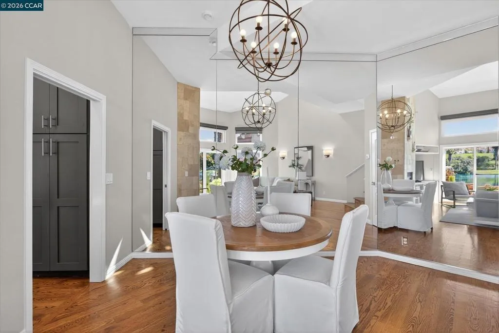Gleaming hardwood floors in living areas.