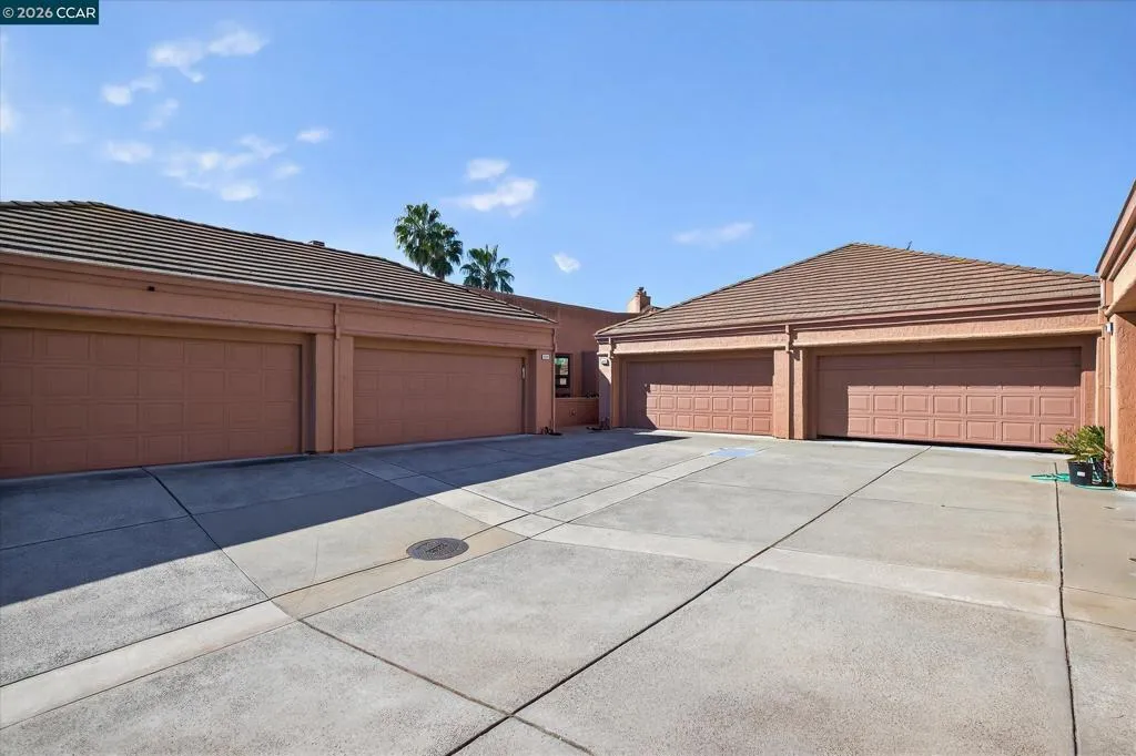 Built in storage units, drop down ladder to additional storage. Interior access to home.