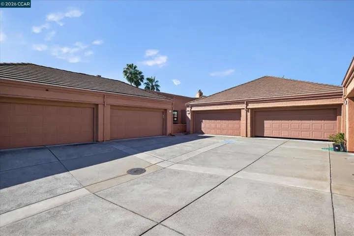 Built in storage units, drop down ladder to additional storage. Interior access to home.