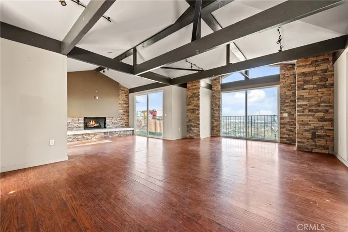 ADU wood beam ceilings and fireplace
