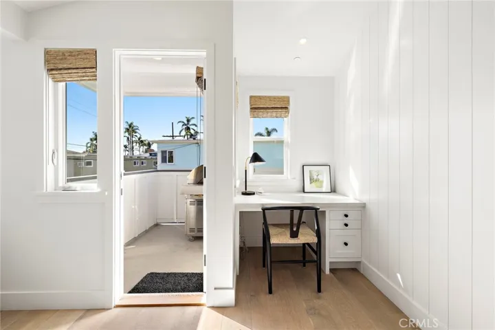 Built in desk area and balcony a with gas grill