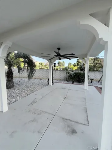 covered patio over looking pool
