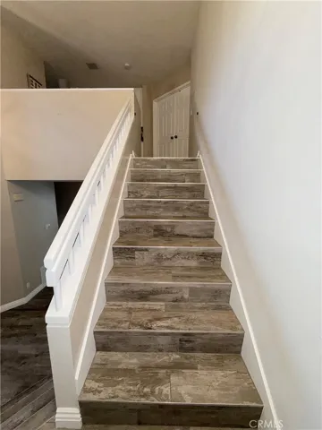 Main House Stairs leading to large Primary Bedroom/Bath- 2 More beds - Hallway Full Bath