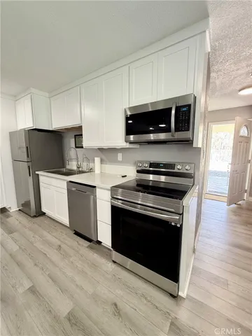 Guest house, kitchen and full-size laundry