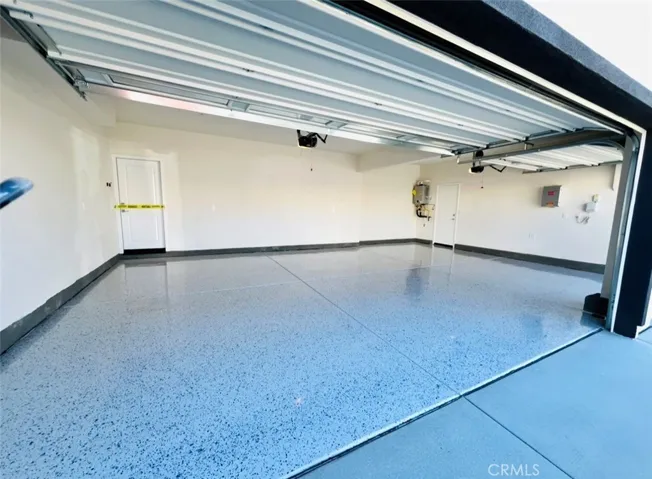 3 car Garage with Epoxy Flooring