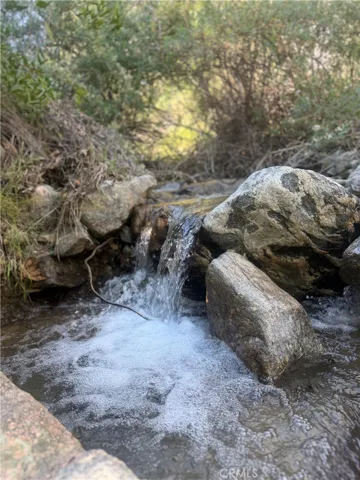 Stream behind Land and gate