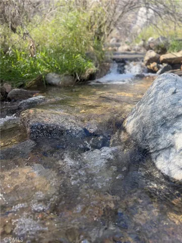 Stream behind Land and gate