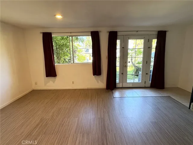 a separate exterior entrance through French doors.