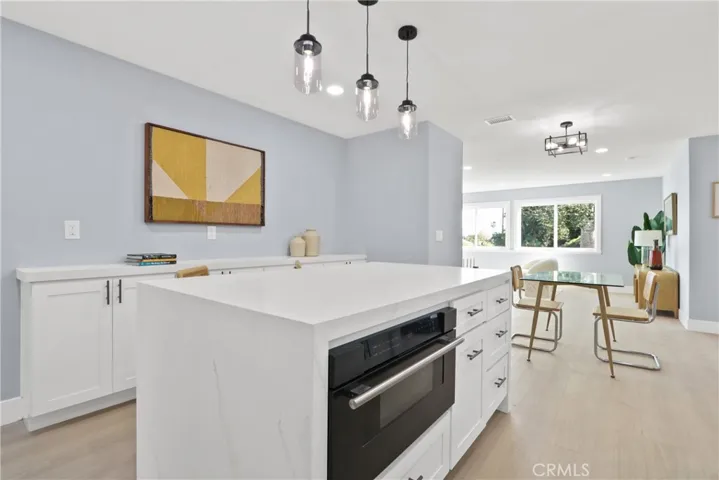 KITCHEN LEADING TO DINING AREA