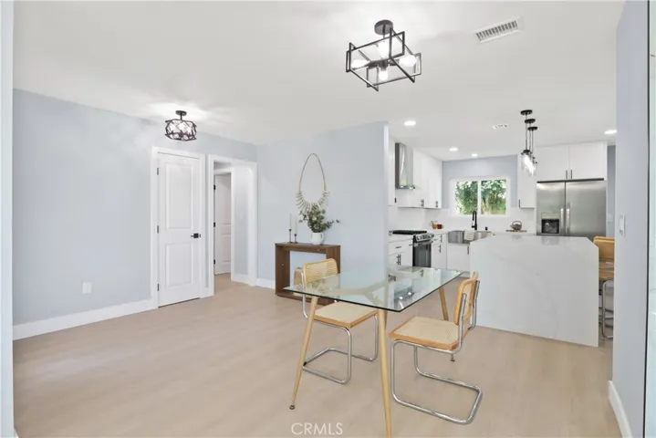 DINING AREA LEADING TO KITCHEN