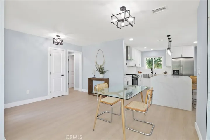 DINING AREA LEADING TO KITCHEN