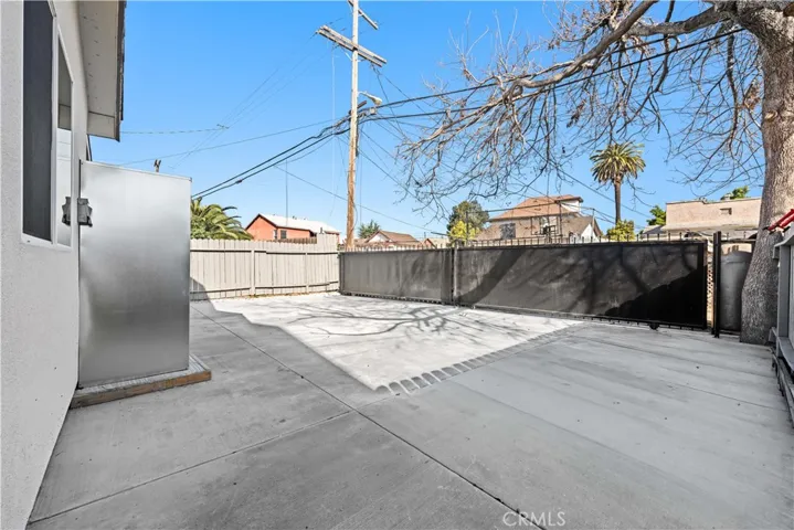 Rear Unit alley access private backyard