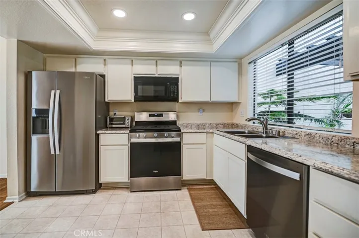 Kitchen has a window to the front entry