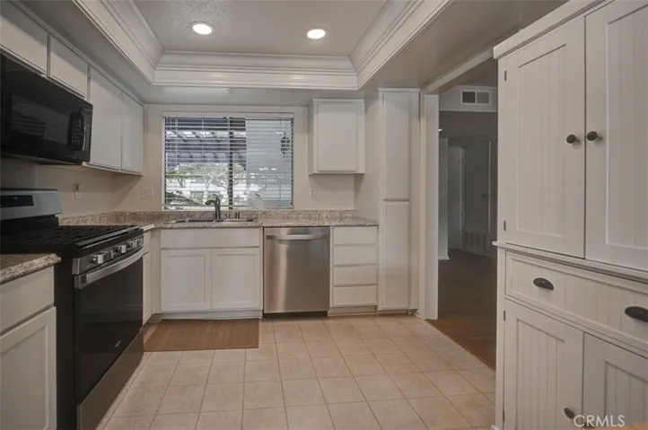 Additional storage cabinets in kitchen