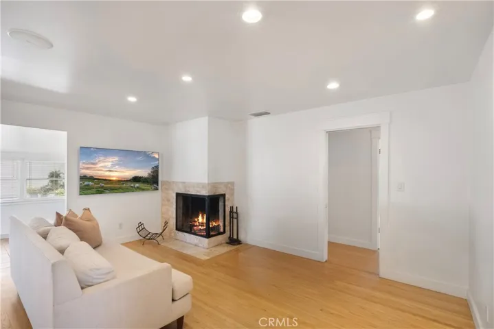 LIVING AREA WITH WOOD BURNING GAS STARTING FIREPLACE