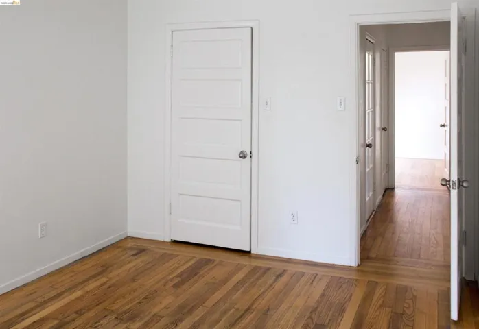 Both bedrooms use the adjoining hallway to the bath. This photo was taken when the unit was vacant.