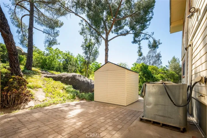 A beautiful back patio acts as a gateway to explore the rest of this huge property.