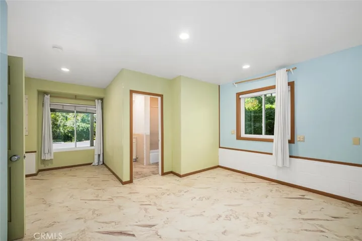 Downstairs master bedroom with ensuite full bath.