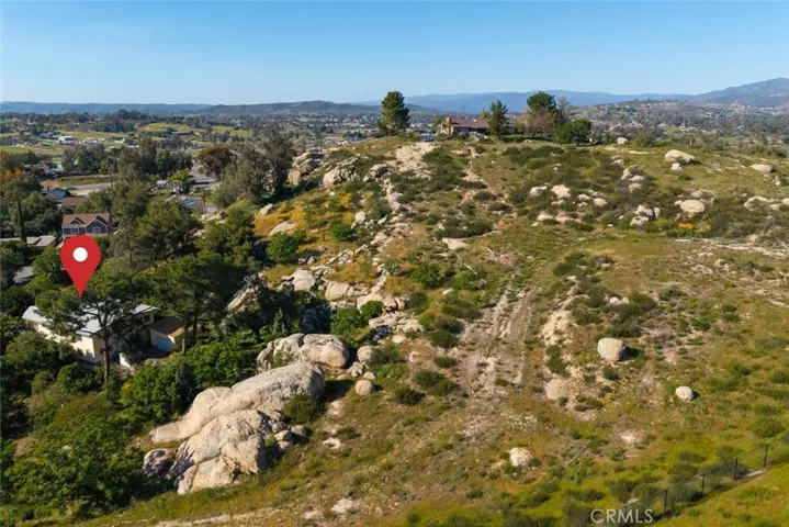 2.82 acres of potential with exceptional convenience to downtown Ramona.