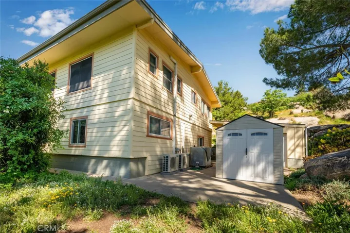 Keep the shed for additional storage or remove to to create an even larger outdoor patio area.