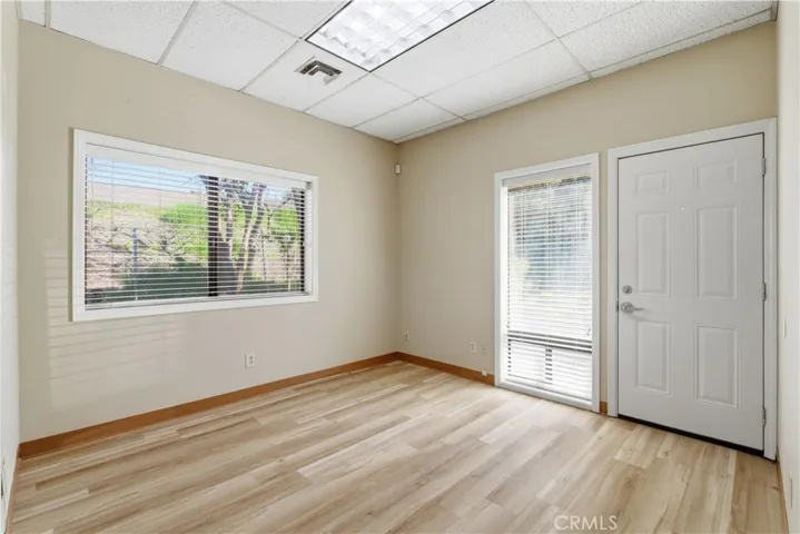 Back Room #3 with rear access to parking area.