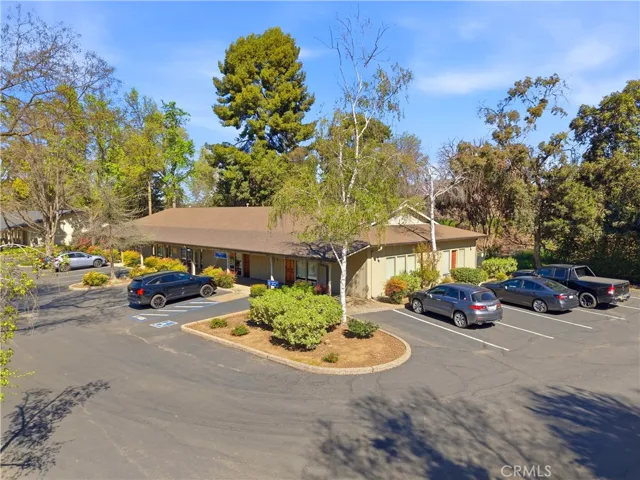 Corner unit with front and rear entry + plenty of parking.