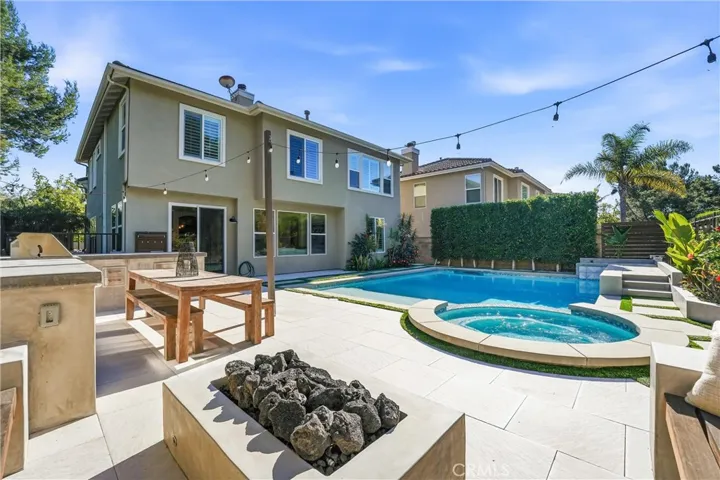 Gather for fun family nights around the firepit and built in seating