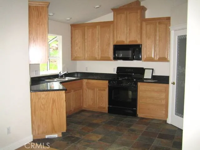 Lovely craftsman style kitchen with slate floors