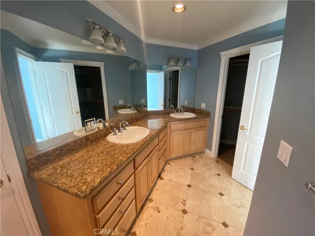 Vanity area in primary bedroom.