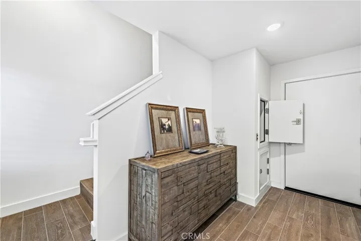 Dumb waiter at foyer off of garage access and front door.