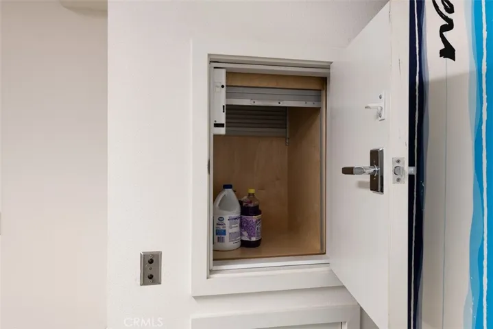 Dumb waiter at foyer off of garage access and front door.