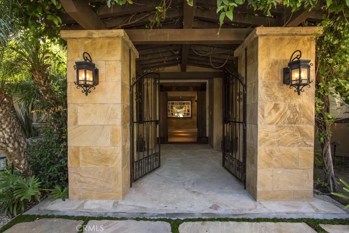 Regal entry surrounded in custom stonework