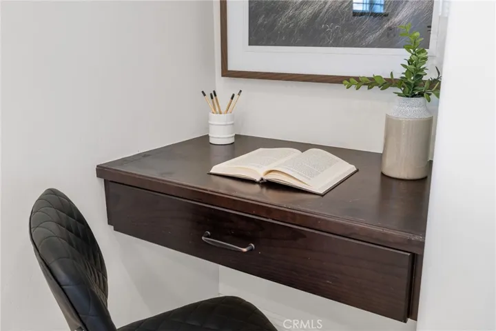 Designated work space with built in desk.